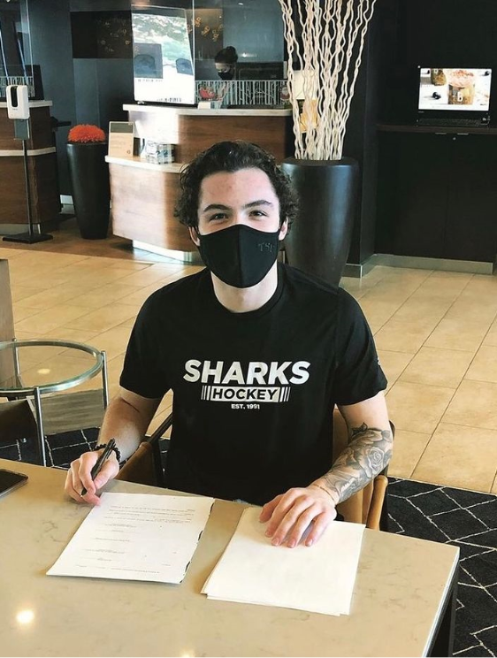 The Sports Corporation NHL Prospect Tristan Robins signing his first NHL contract with the San Jose Sharks